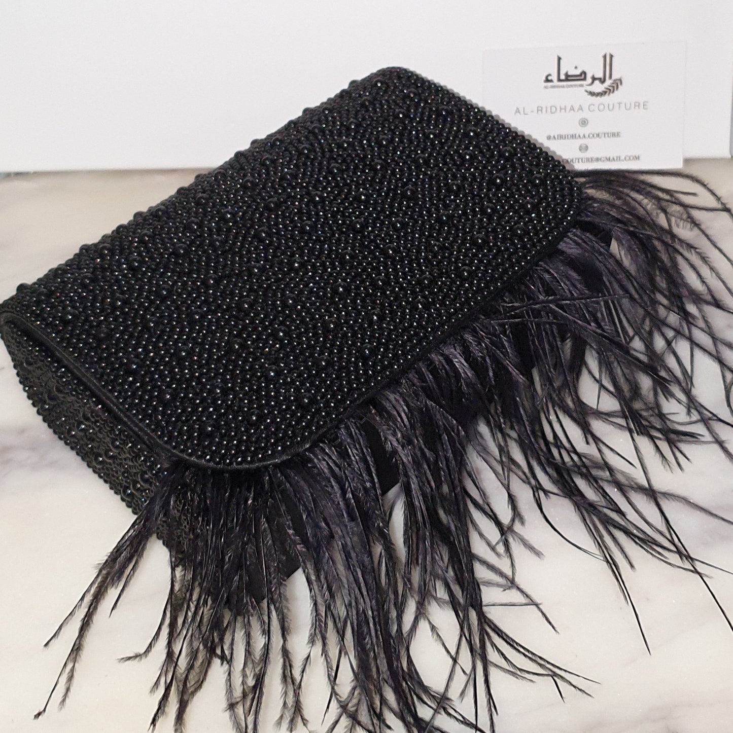 Afifa - Feather Satin Clutch Bag