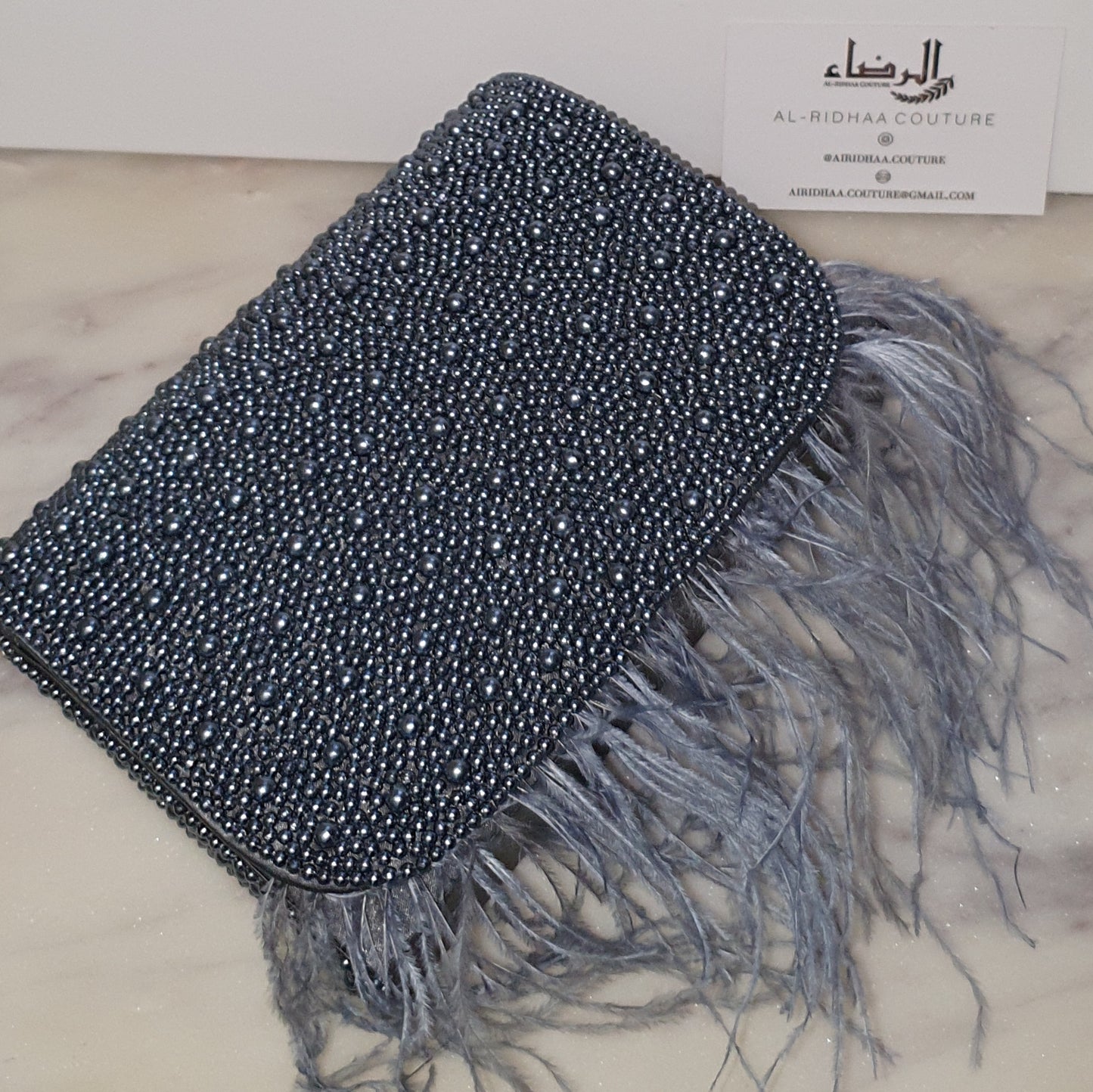 Afifa - Feather Satin Clutch Bag