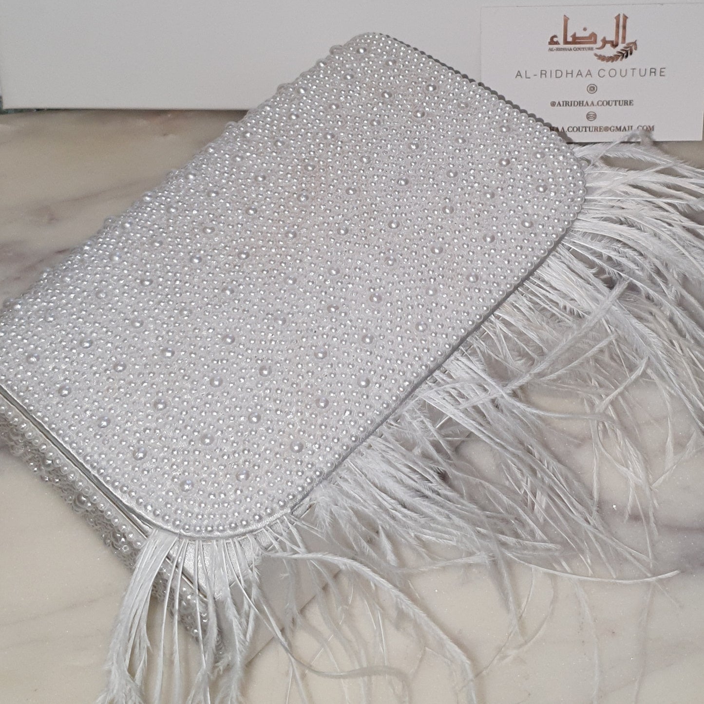 Afifa - Feather Satin Clutch Bag