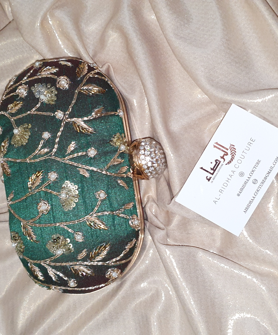 Small Oval Embroidered Clutch